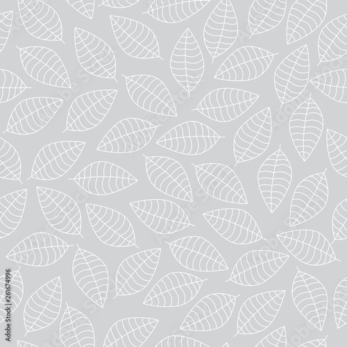 Vector seamless pattern with white leaves silhouettes on a grey background