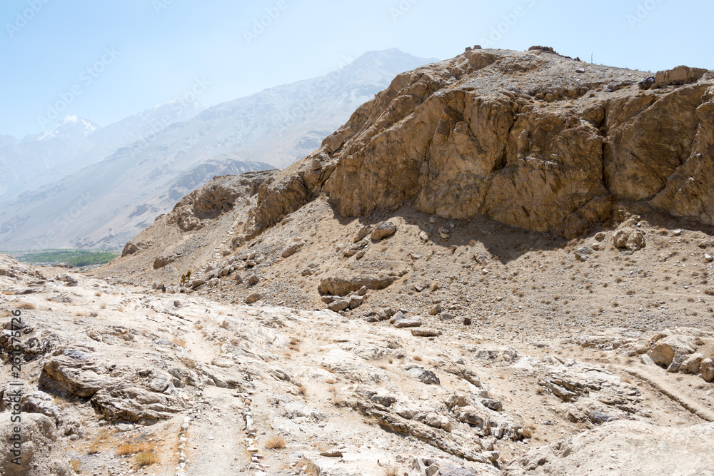 Ishkashim, Tajikistan - Aug 23 2018: Ruins of Khaakha Fortress in the Wakhan Valley in Ishkashim, Gorno-Badakhshan, Tajikistan. It is located in the Tajikistan and Afghanistan border. Ishkashim, Tajikistan - Aug 23 2018: Ruins of Khaakha Fortress in the Wakhan Valley in Ishkashim, Gorno-Badakhshan, Tajikistan. It is located in the Tajikistan and Afghanistan border.