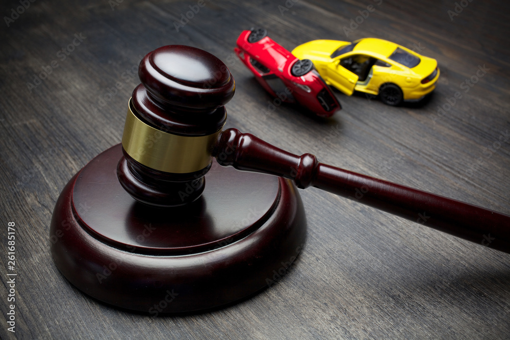 hammer of the judge and two collided cars, accident,