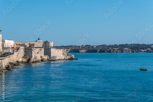 Fototapeta Naklejka Na Ścianę i Meble -  View of the Still Mediterranean Sea and Syracuse, Sicily, Italy