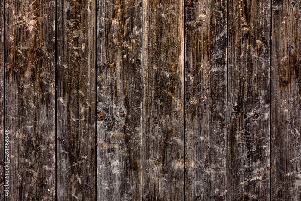 The look of a wooden wall from the boards, a beautiful texture, a village.