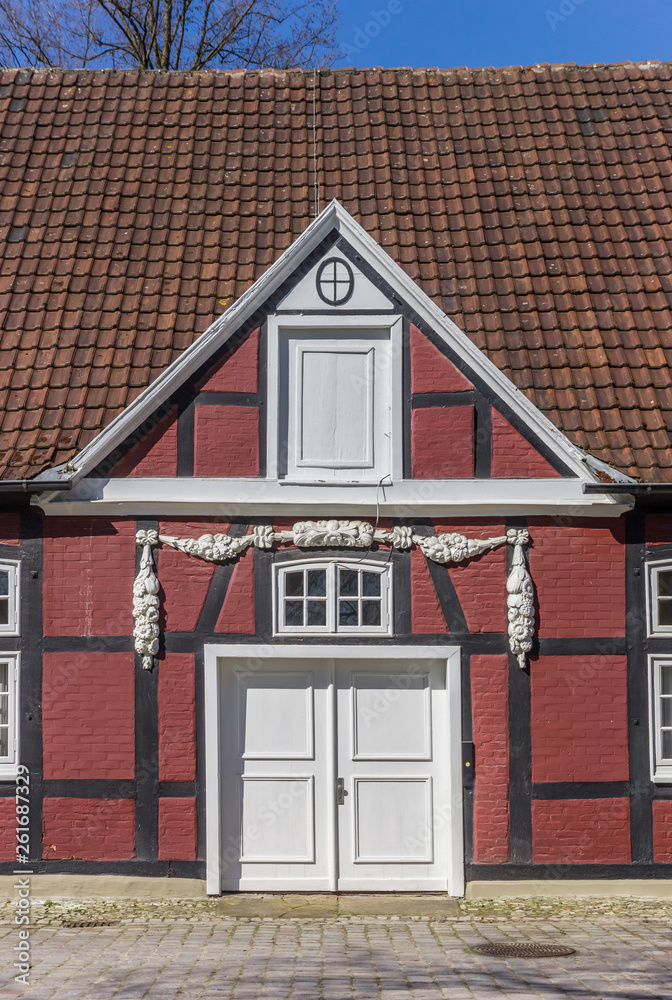 Entrance to red half timbered house in the castle park in Rheda, Germany