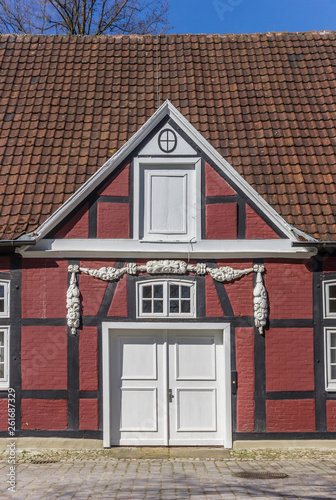 Entrance to red half timbered house in the castle park in Rheda, Germany © venemama