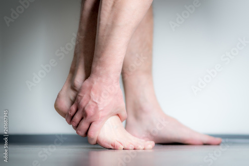 man with pain in foot © stockfotocz