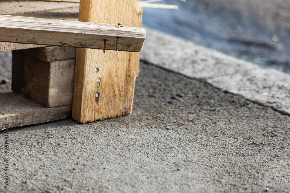 Damaged pallet on asphalt Damaged pallet on asphalt