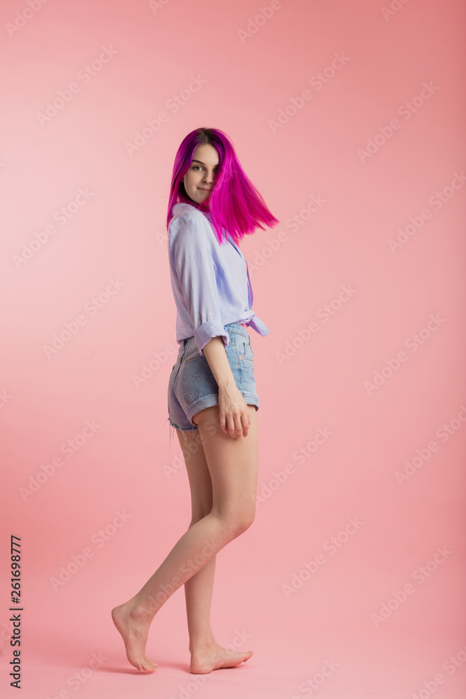 beautiful hipster with flying hair looking at the camera, full length photo beautiful hipster with flying hair looking at the camera, full length photo