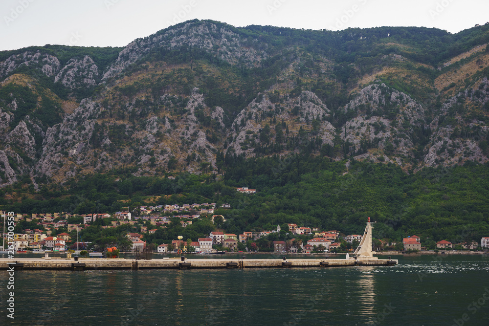 Small lighthouse on the pier in the city of Kotor, Montenegro.