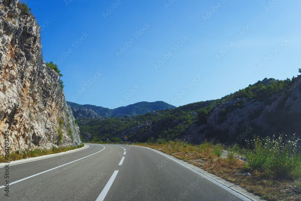 Travel by car. Good asphalt road in the mountains. Trip to Europe, the Mediterranean and the Balkans.