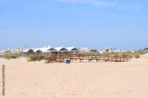 Wooden pedestrian bridge to the beach