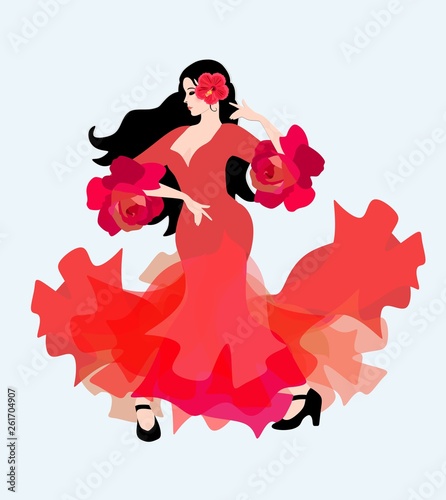 Spanish girl in a long red dress with ruffles on the sleeves in the form of roses dancing flamenco. The symbol of Spain.