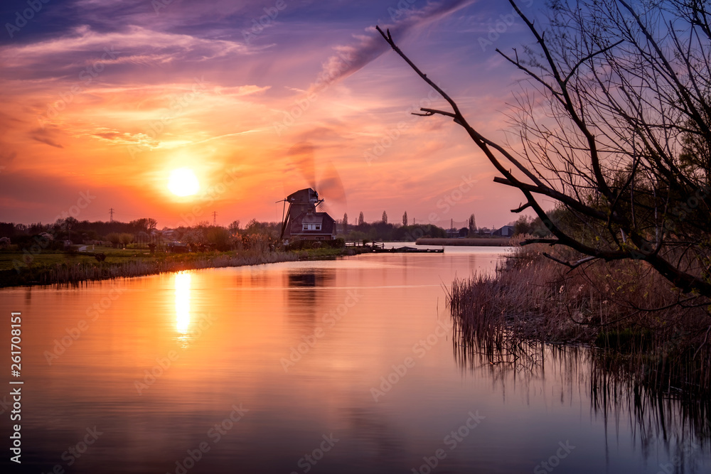 Fototapeta premium Windmill at sunset
