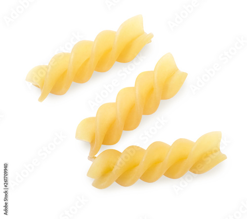 Three raw italian yellow pasta torti isolated on white background. Top view.
