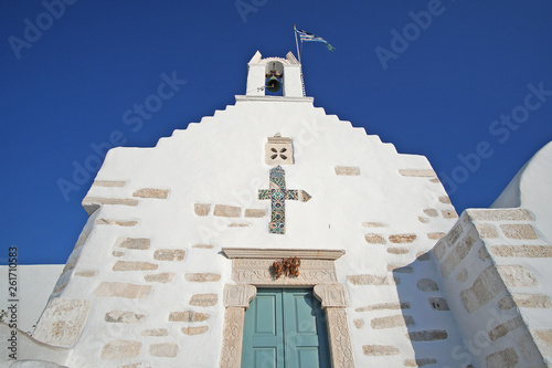 The church of Agios Konstantinou, a traditional cycladic church with blue dome in the town of Paroikia photo