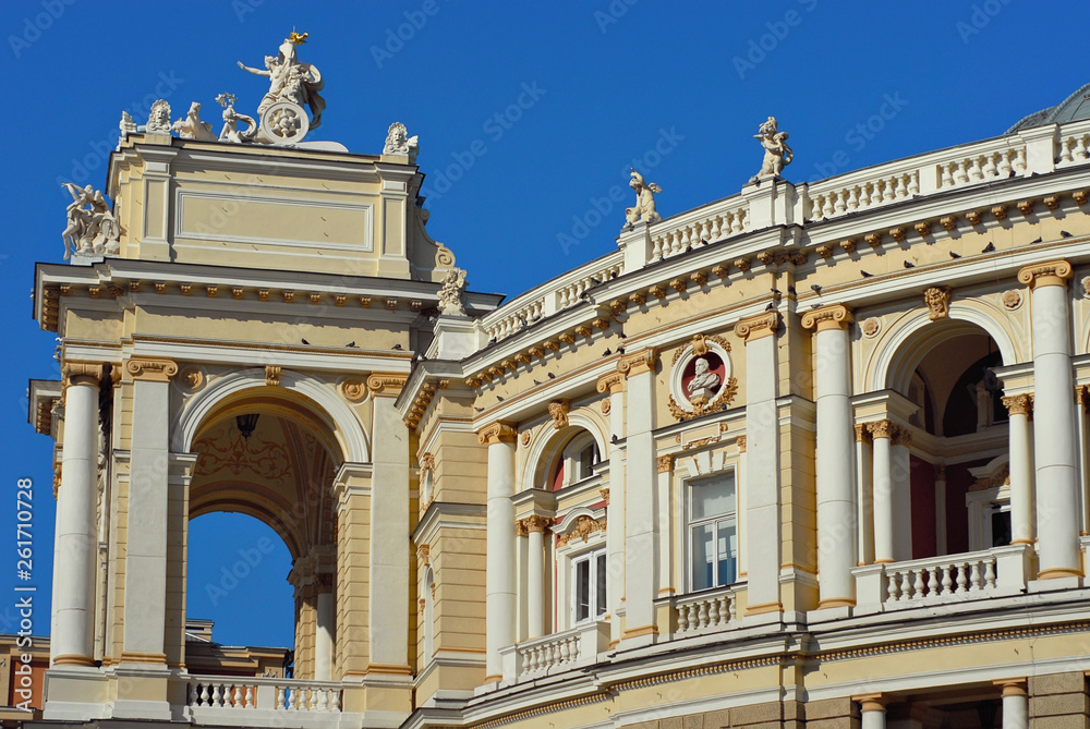 National and Academic Opera and Ballet Theater. Odessa, Ukraine. Europe. Element of architecture. Building on the blue sky background. National and Academic Opera and Ballet Theater. Odessa, Ukraine. Europe. Element of architecture. Building on the blue sky background.