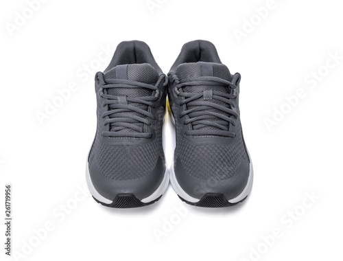 Unbranded black sport running shoes or sneakers isolated on white background.
