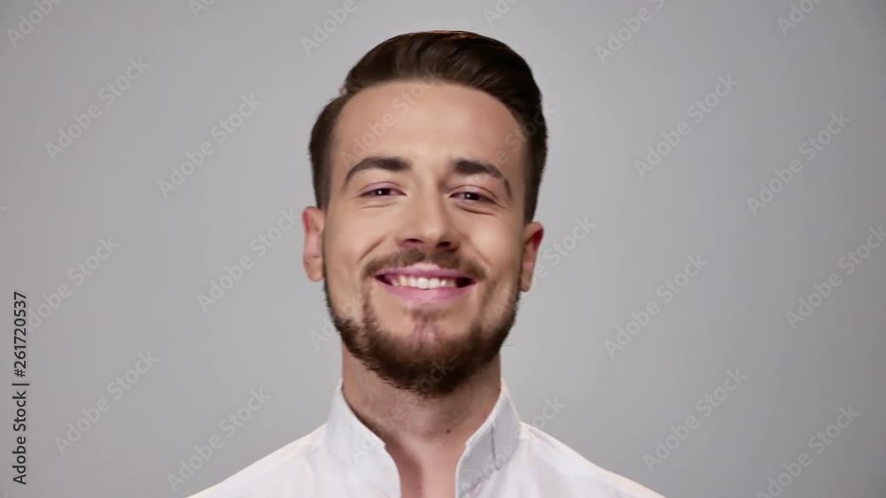 Man loking at camera and smiling. Portrait of happy fashionable handsome man