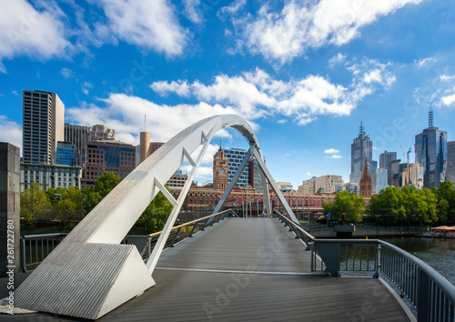 Melbourne city with blue sky with walk way to train station and city, Australia photo