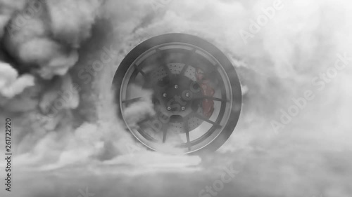 Tire Burnout. Burning rubber and Smoking tire with a rotating wheel with thick Smoke on dark background. photo