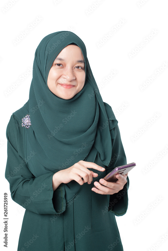 Malay woman using mobile phone Malay woman using mobile phone