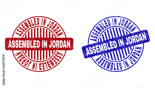 Grunge ASSEMBLED IN JORDAN round stamp seals isolated on a white background. Round seals with grunge texture in red and blue colors.