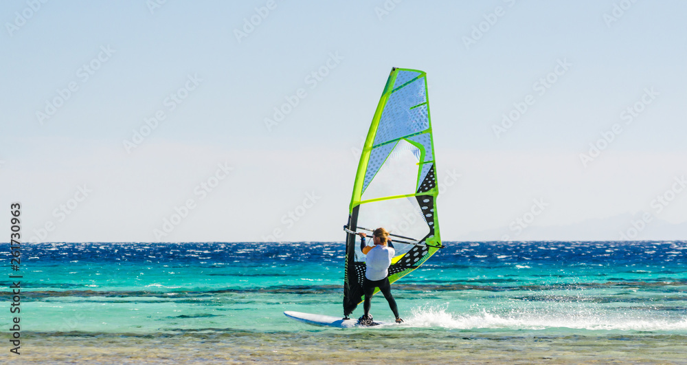 one surfer rides in the Red Sea in Egypt Dahab one surfer rides in the Red Sea in Egypt Dahab