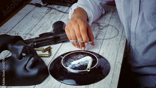 Konstfotografi Drugs addicted dealer man's hand holding syringe with cocaine, rolled banknote ,