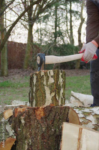 Chopping wood with axe