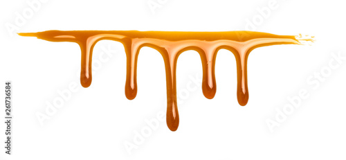 sweet caramel sauce isolated on white background Top view or flat lay. Caramel isolated on white with clipping path. photo