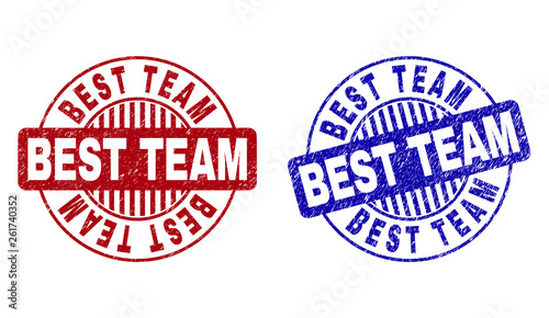 Grunge BEST TEAM round stamp seals isolated on a white background. Round seals with grunge texture in red and blue colors. Vector rubber imitation of BEST TEAM text inside circle form with stripes.