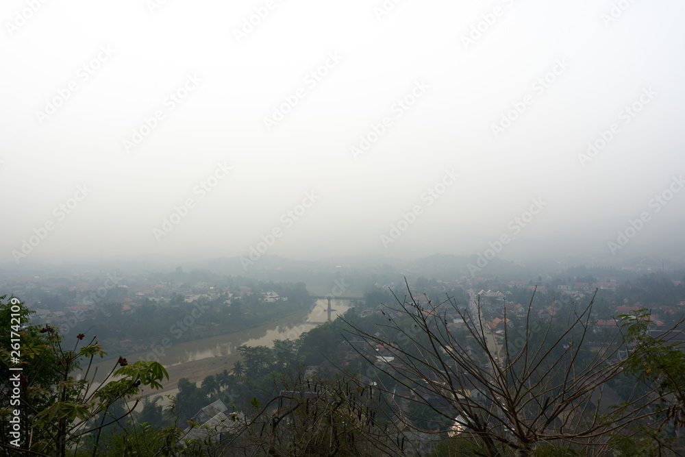 LUANG PRABANG LAOS APRIL 14.2019 : view from Mount Phou Si, Phu Si, High hill in the centre of the old town of Luang Prabang in Laos LUANG PRABANG LAOS APRIL 14.2019 : view from Mount Phou Si, Phu Si, High hill in the centre of the old town of Luang Prabang in Laos