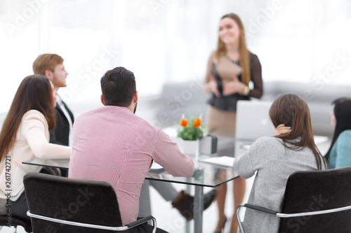 blurred image of a briefing in a modern office © yurolaitsalbert