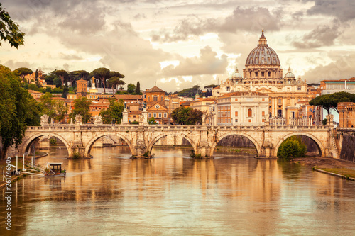 Morning view of Basilica St Peter and bridge Sant Angelo in Vatican City Rome Italy. Rome architecture and landmark.  St. Peter's cathedral in Rome.