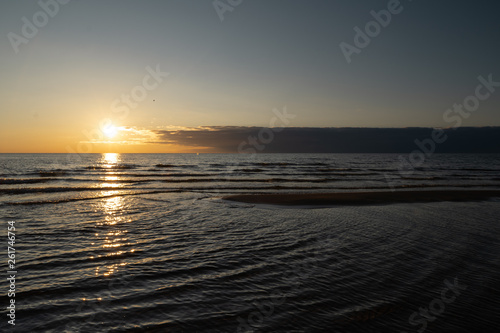 Vivid sunset with very low sun on the Baltic Sea - Red colors - Tuja  Latvia - April 13  2019