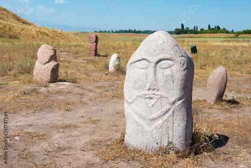 Tokmok, Kyrgyzstan - Aug 08 2018: Kurgan stelae at Ruins of Balasagun in Tokmok, Kyrgyzstan. Balasagun is part of the World Heritage Site-Silk Roads: the Routes Network of Chang'an-Tianshan Corridor.