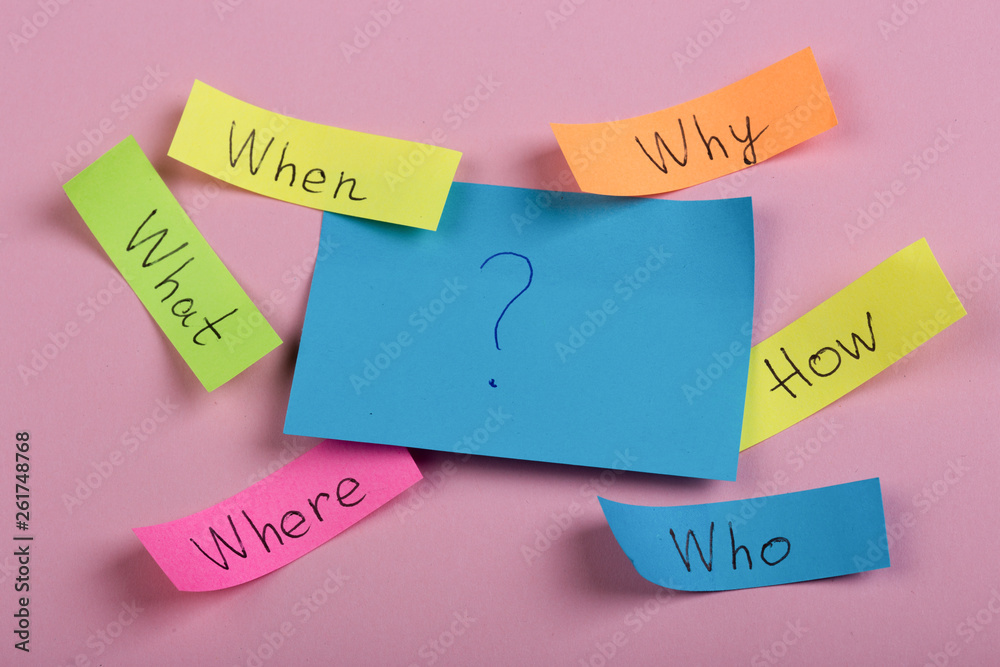 Fototapeta Questions - Why? What? Where? When? Why? How? on colorful stickers on pink backround