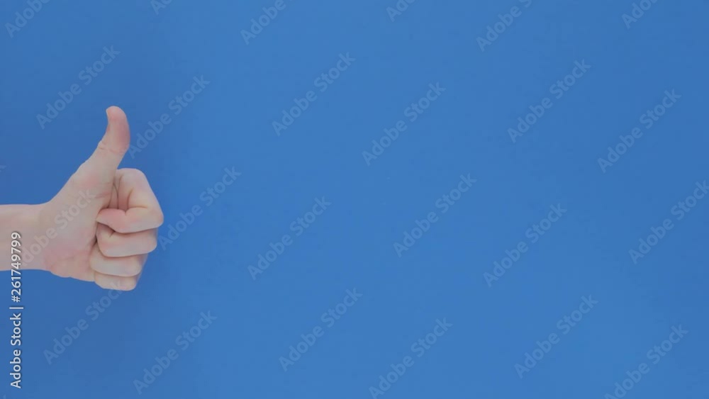 Man's hand pointing and giving thumbs up Man's hand pointing and giving thumbs up