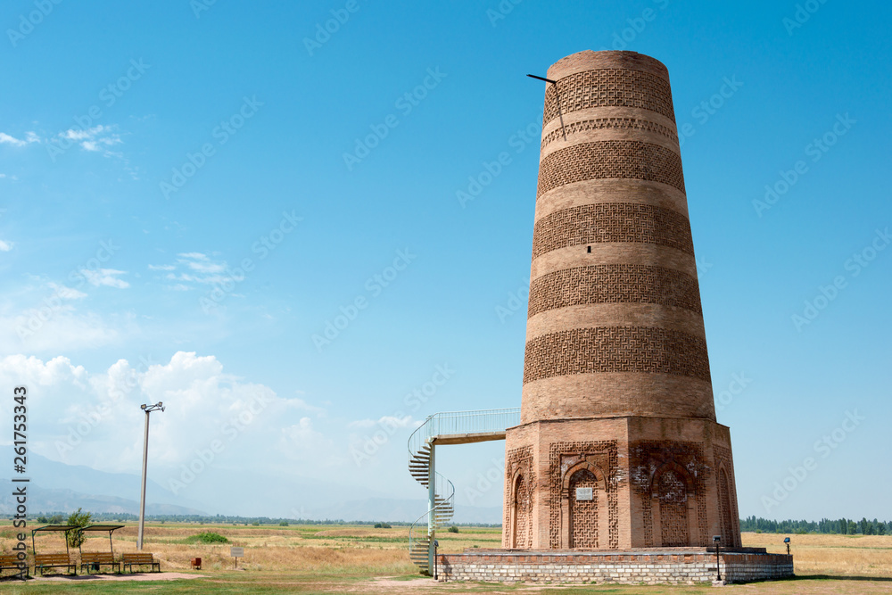 Tokmok, Kyrgyzstan - Aug 08 2018: Ruins of Burana Tower in Tokmok,  Kyrgyzstan. It is part of the World Heritage Site - Silk Roads: the Routes  Network of Chang'an-Tianshan Corridor. Stock Photo