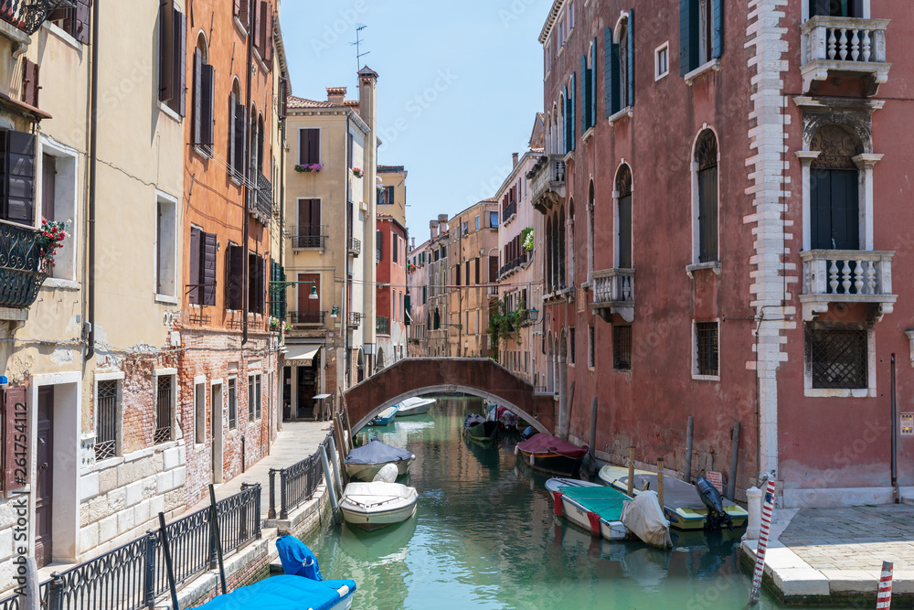 Panoramic view of Venice narrow canal with historical buildings