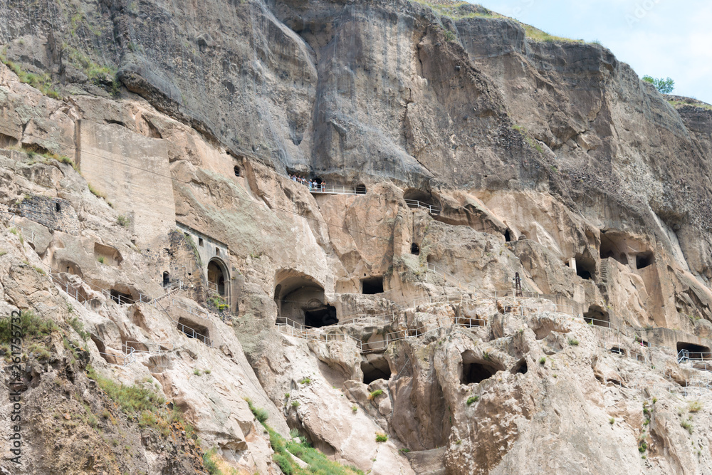 Vardzia, Georgia - Jul 14 2018: Vardzia Cave Monastery complex and ancient city. a famous historic site in Vardzia, Samtskhe-Javakheti, Georgia. Vardzia, Georgia - Jul 14 2018: Vardzia Cave Monastery complex and ancient city. a famous historic site in Vardzia, Samtskhe-Javakheti, Georgia.