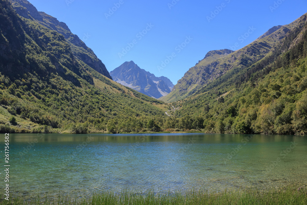 Closeup view of lake scenes in mountains, national park Dombay, Caucasus