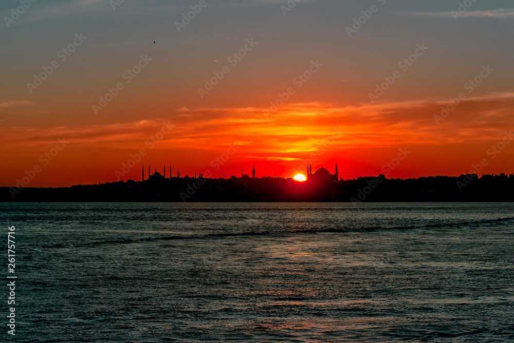 Fototapeta premium Istanbul, Turkey, 06 July 2006: Sunset at Kadikoy