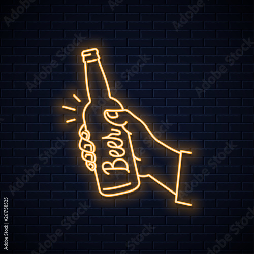 Hand hold beer bottle neon sign. Male a beer