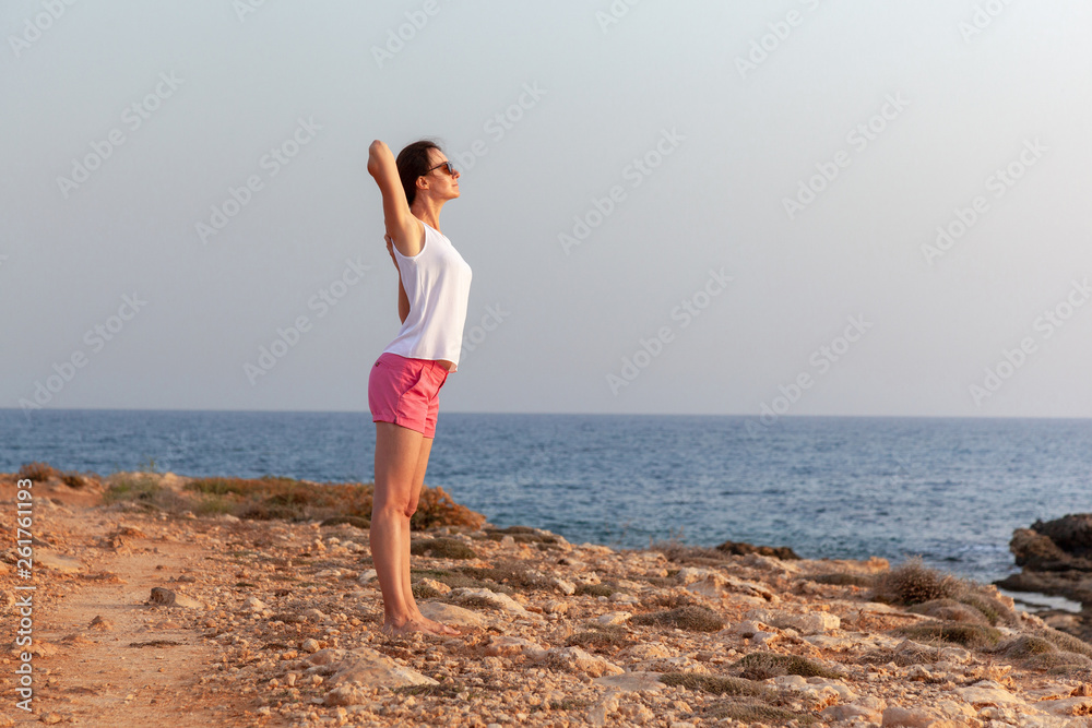 Morning exercises near the sea
