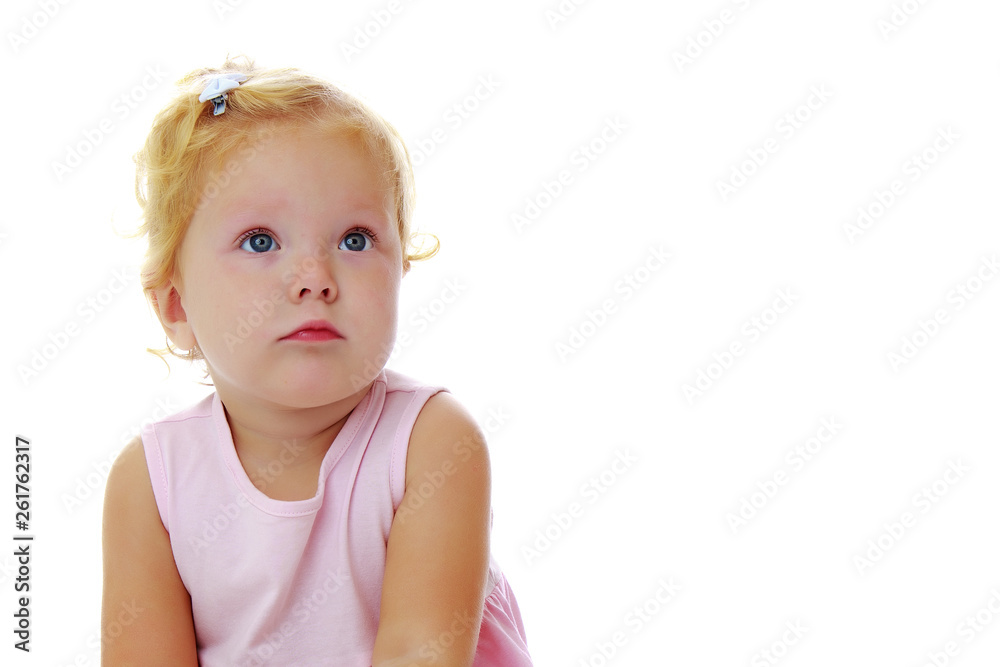 Little girl posing in the studio. Close-up. Little girl posing in the studio. Close-up.