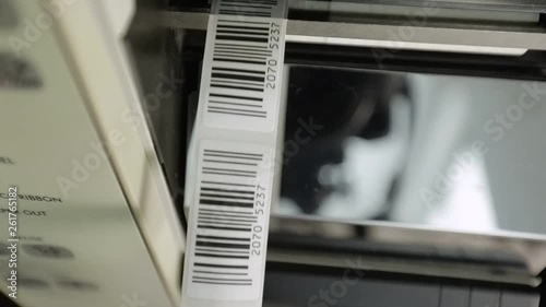 Closeup on barcode enterprise printer when printing barcode labels