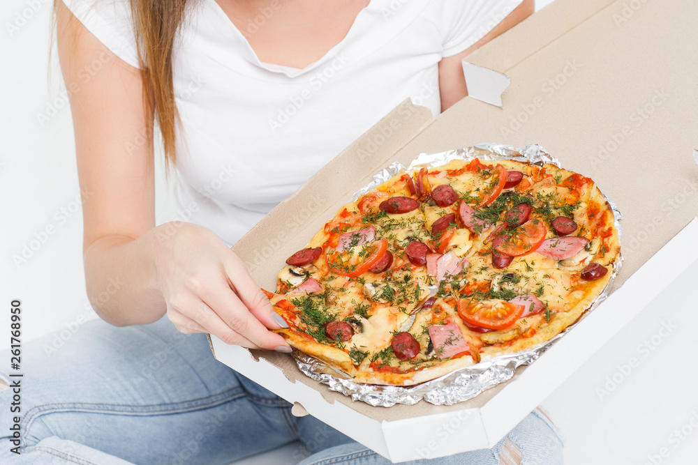 Pizza on hand woman. Food concept!