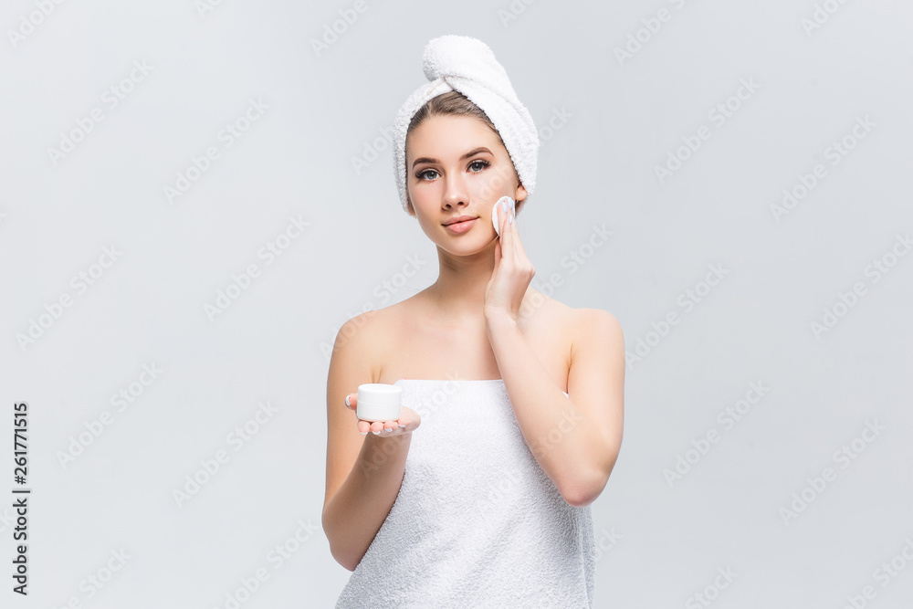 Gorgeous young woman with white sponge and cream on hands posing to the camera , after shower! Gorgeous young woman with white sponge and cream on hands posing to the camera , after shower!