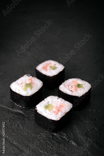 sushi on black stone