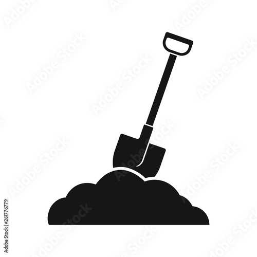 Shovel in soil icon. Vector. Flat design. Isolated. photo
