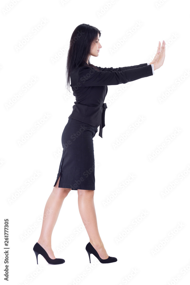 side view. young business woman showing stop gesture